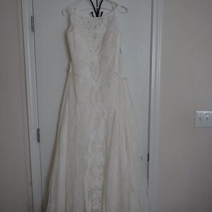 Brand new Melissa Sweet wedding dress! Never worn, never altered. Color:Ivory